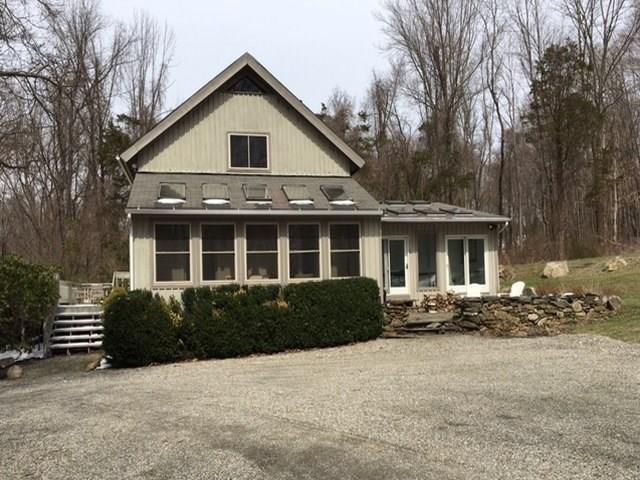 30 Valley View Road Kent, CT 06757 - Photo 1 of 1 a front view of a house with garden