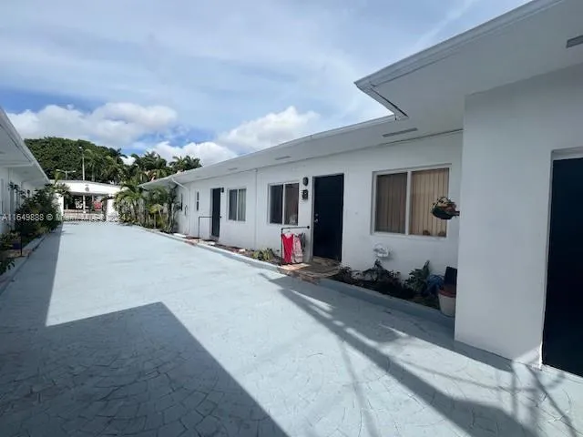 a front view of a house with yard
