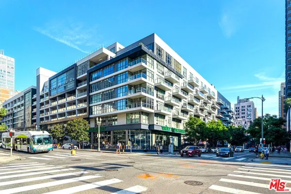 a view of a building and a street