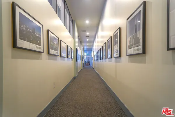 a view of a hallway with staircase