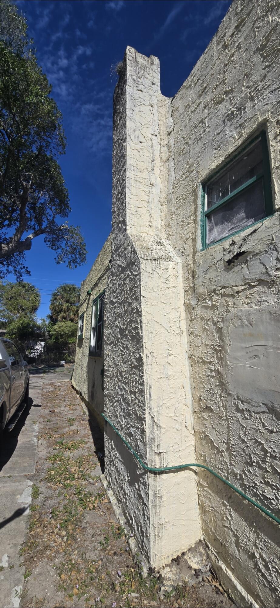1150 West 25th Street Riviera Beach, FL 33404 - Photo 3 of 19 a brick building with a outdoor space