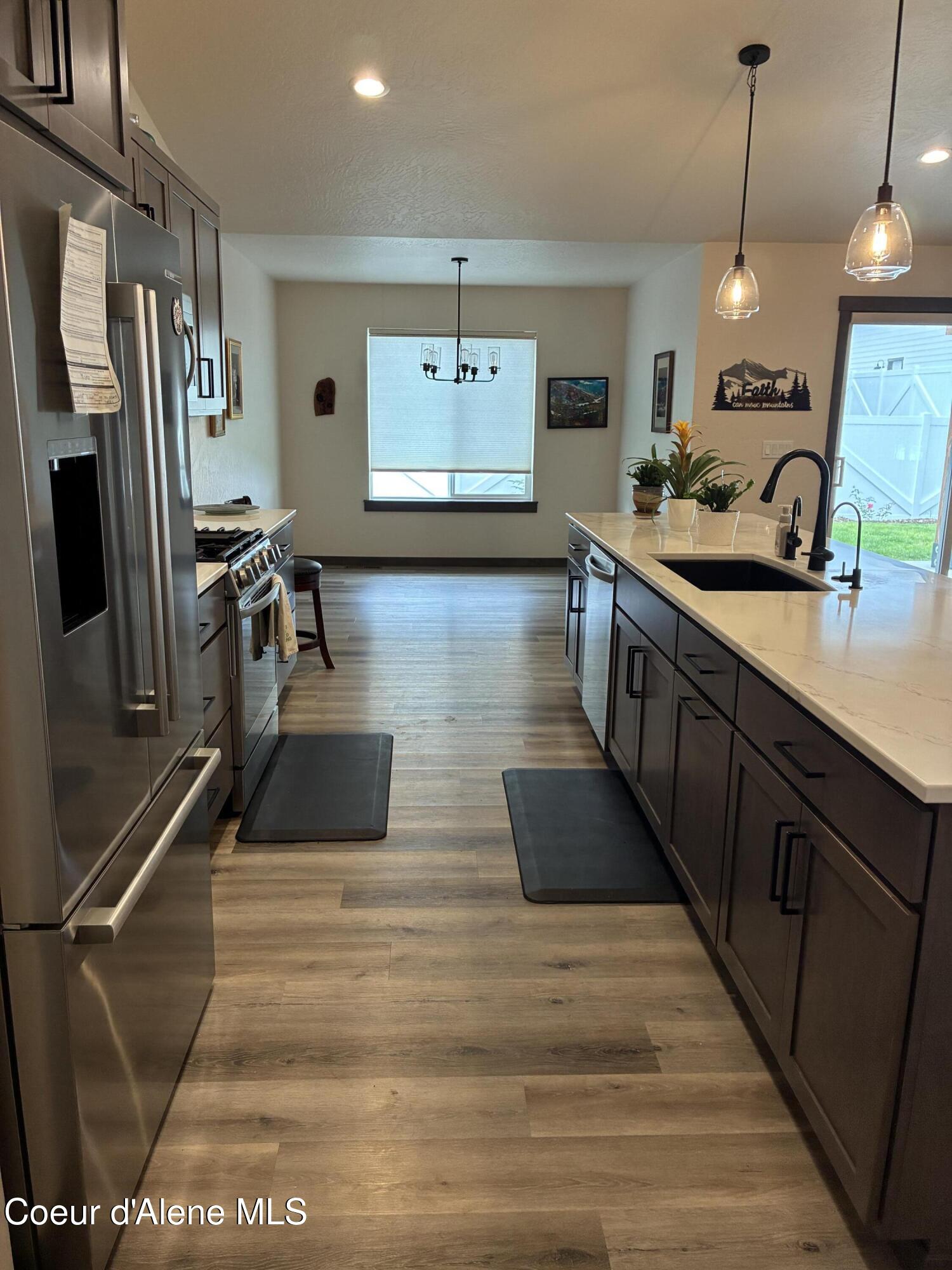 9060 West Oats Avenue Rathdrum, ID 83858 - Photo 12 of 28 KITCHEN AND DINING AREA