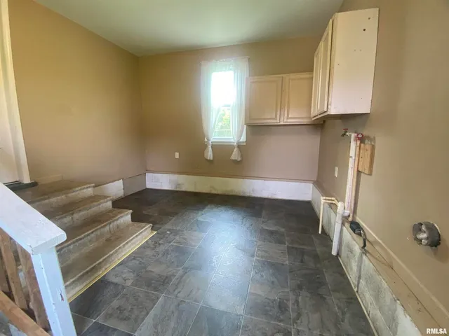 a view of a storage & utility room in a house