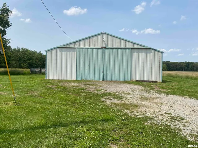 a view of a backyard with a garden