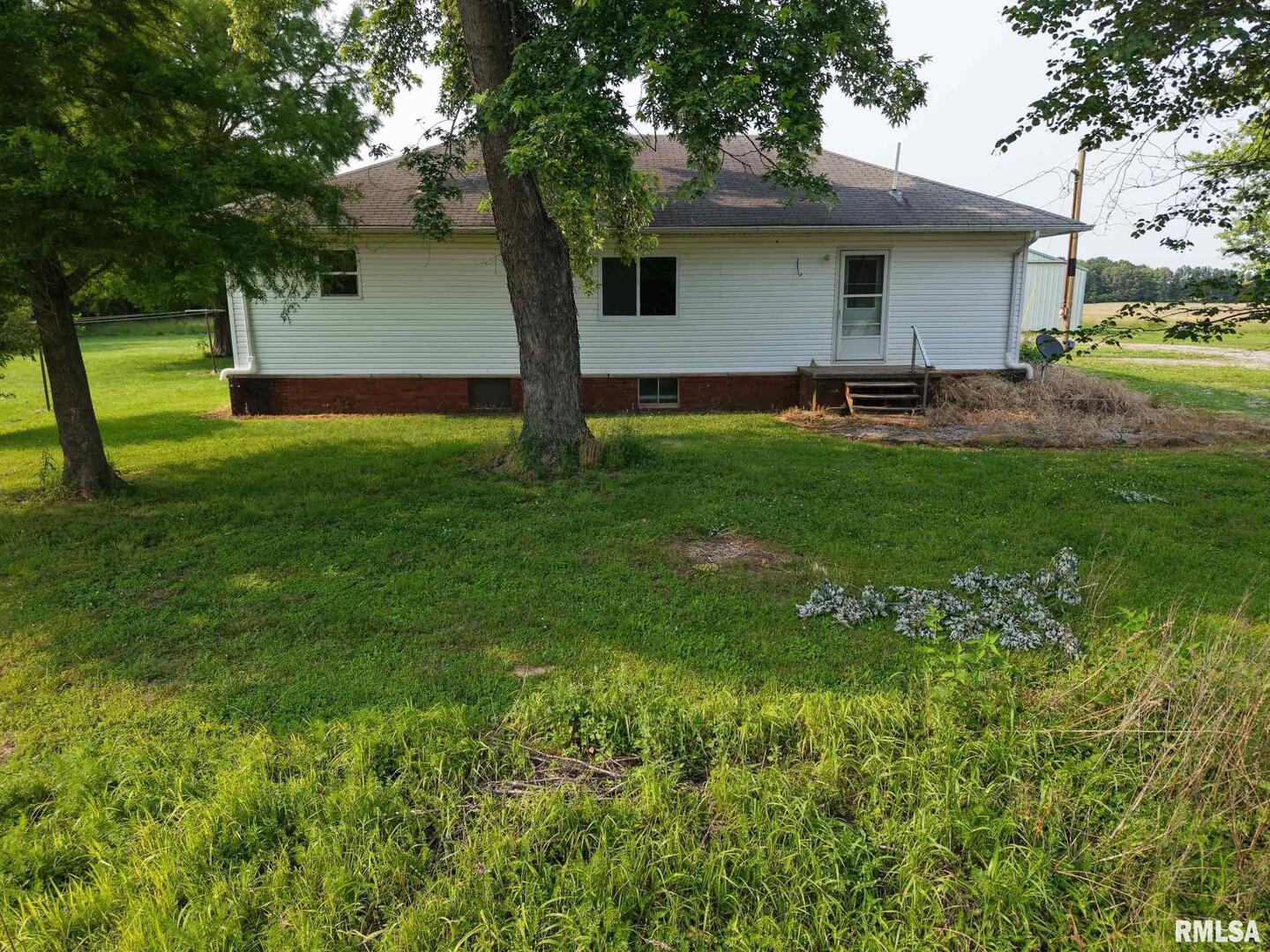 22545 Thompsonville Lake Road Thompsonville, IL 62890 - Photo 37 of 38 a front view of house with yard and green space