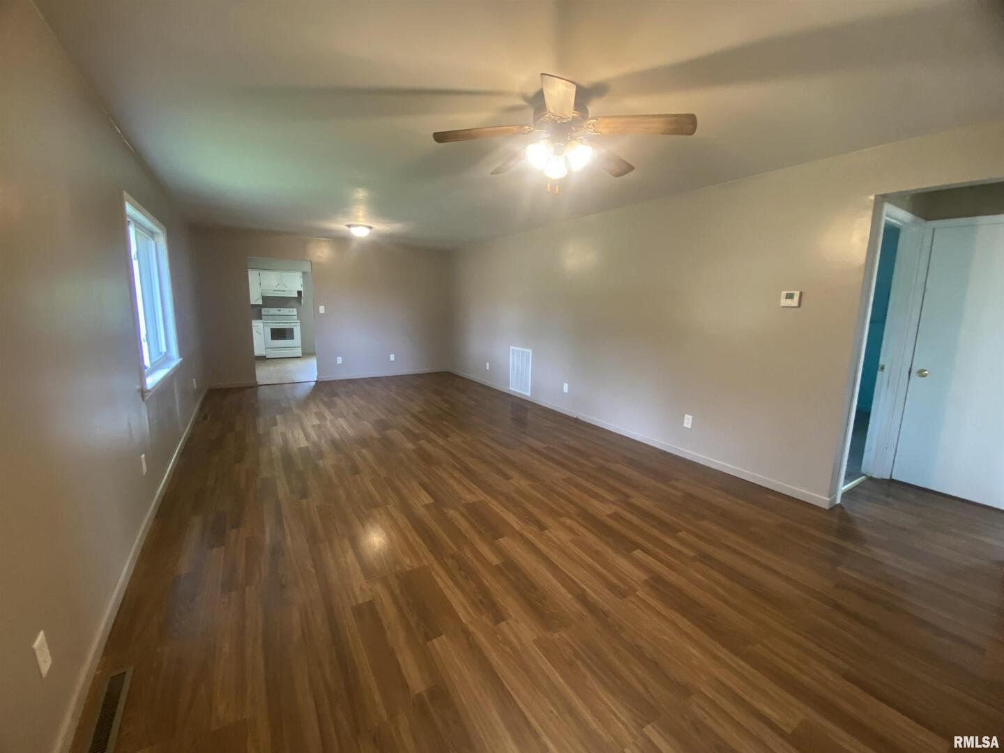 22545 Thompsonville Lake Road Thompsonville, IL 62890 - Photo 10 of 38 a view of a room with wooden floor