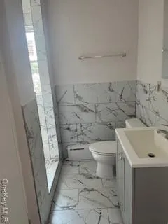 a bathroom with a sink and toilet