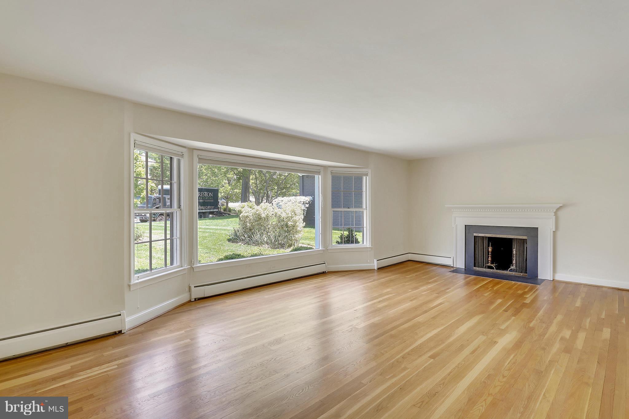 6120 Overlea Road Bethesda, MD 20816 - Photo 5 of 30 Living Room with wood burning fireplace