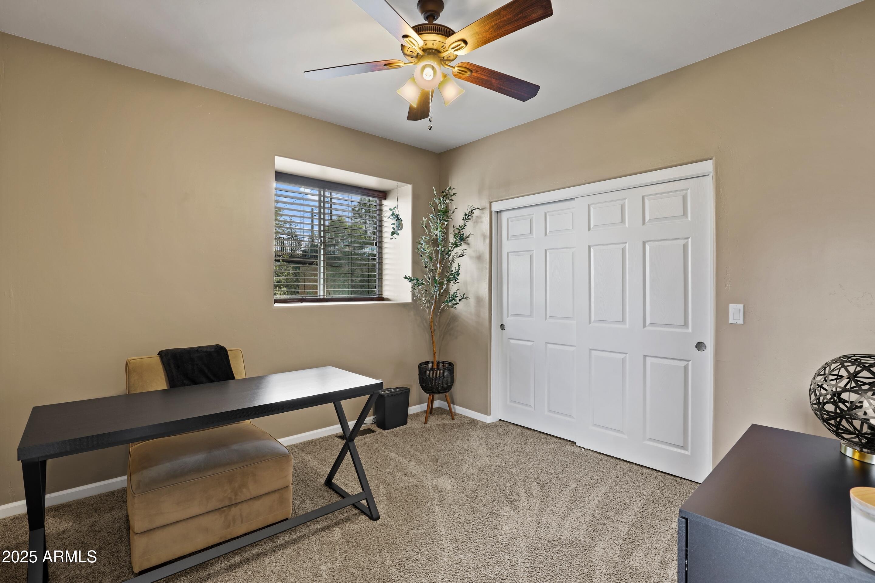 308 West Rim View Road Payson, AZ 85541 - Photo 34 of 57 a living room with furniture and a window