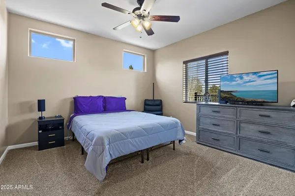 a view of a balcony with wooden floor