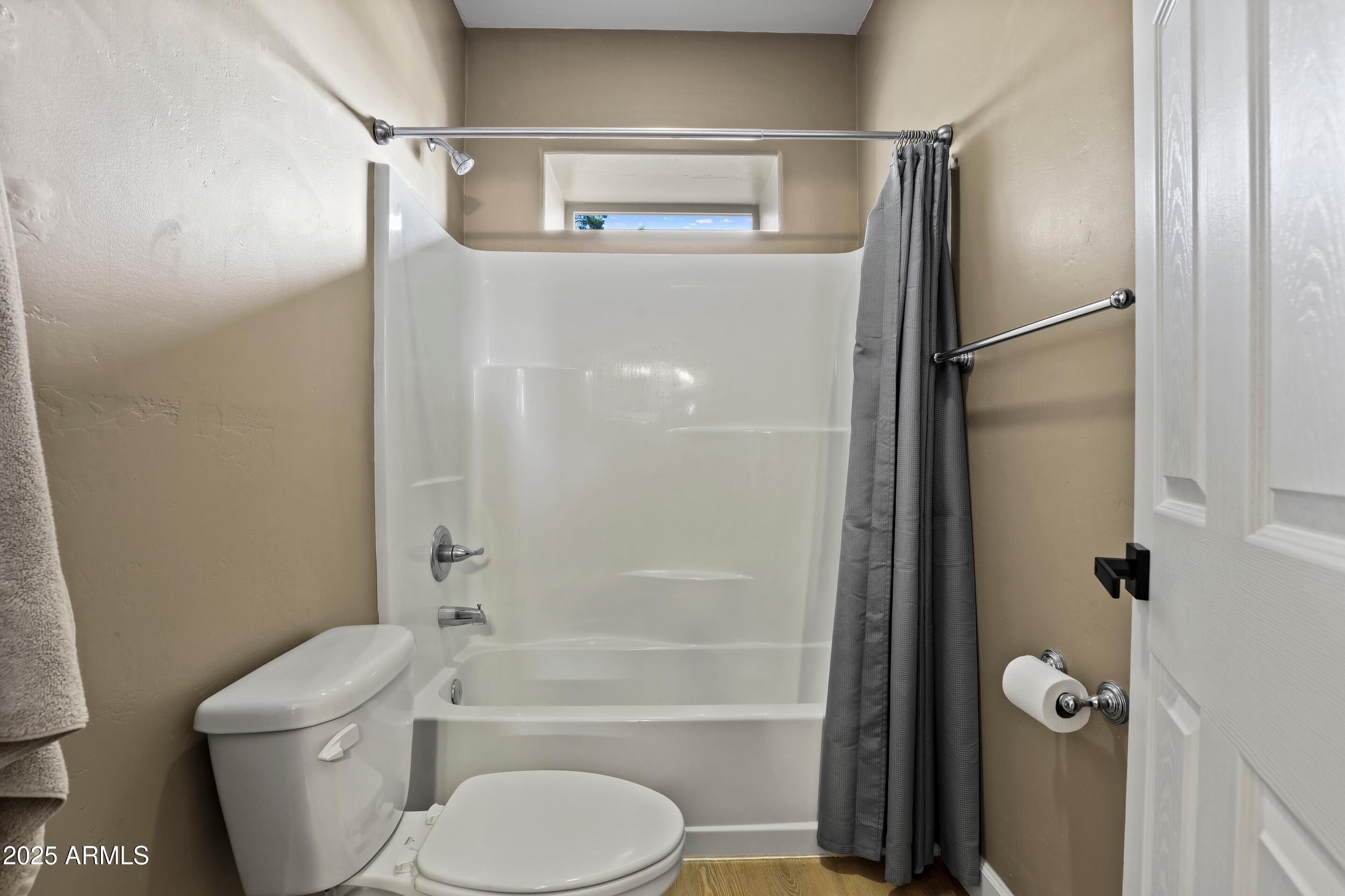 308 West Rim View Road Payson, AZ 85541 - Photo 39 of 57 a bathroom with a toilet and a shower