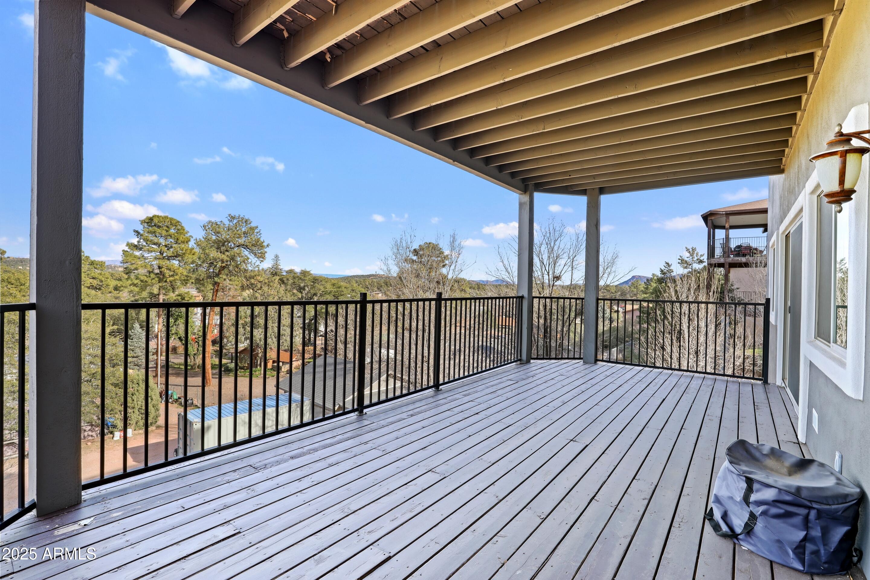 308 West Rim View Road Payson, AZ 85541 - Photo 42 of 57 a view of a balcony with wooden floor