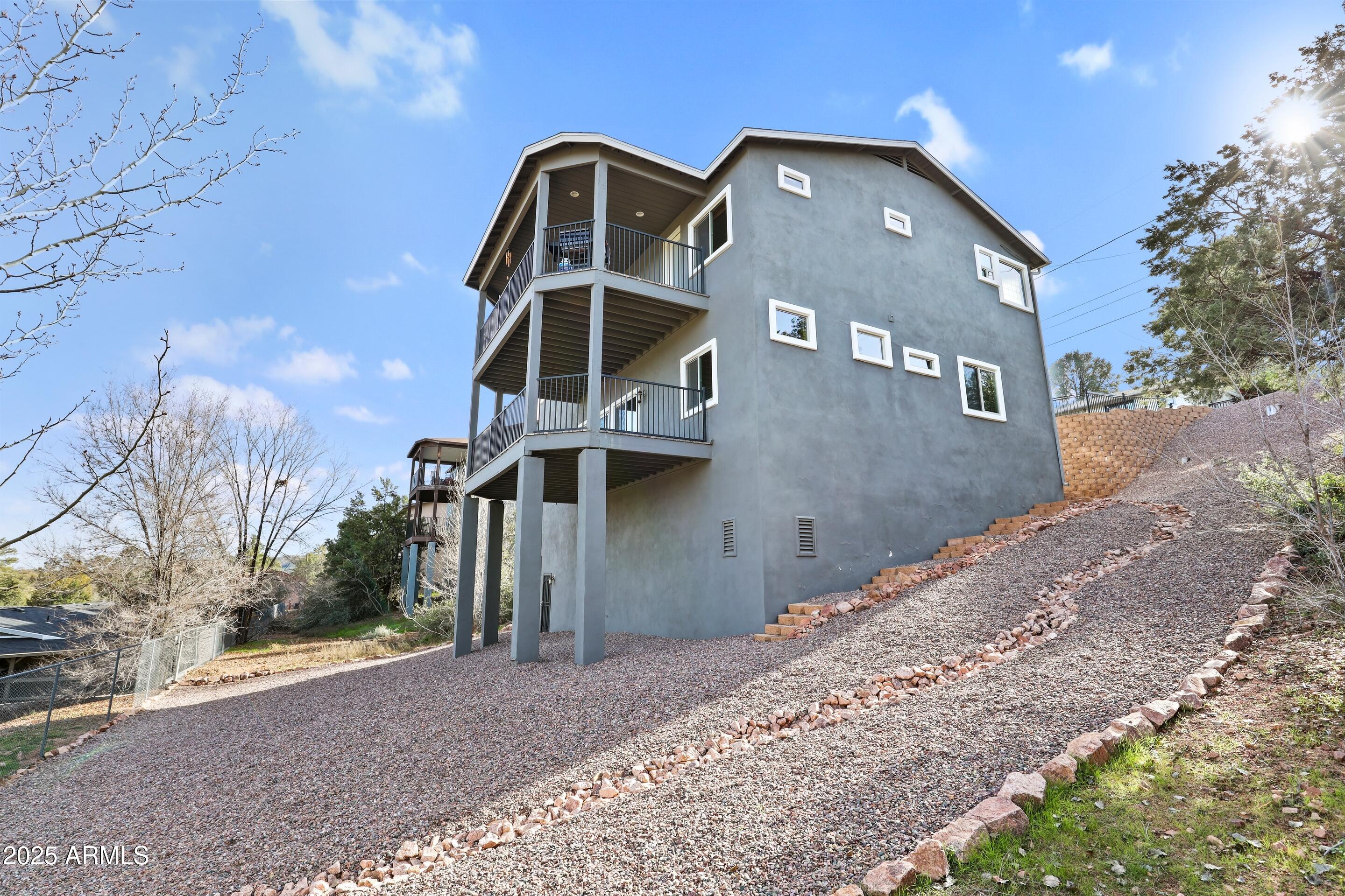 308 West Rim View Road Payson, AZ 85541 - Photo 47 of 57 a front view of a house with a yard