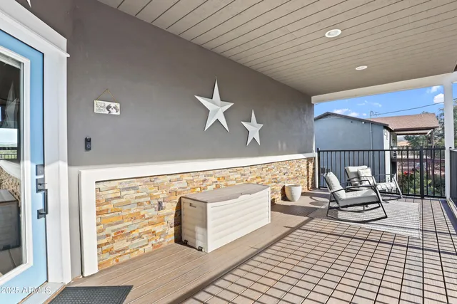 a view of a chairs and table on the deck