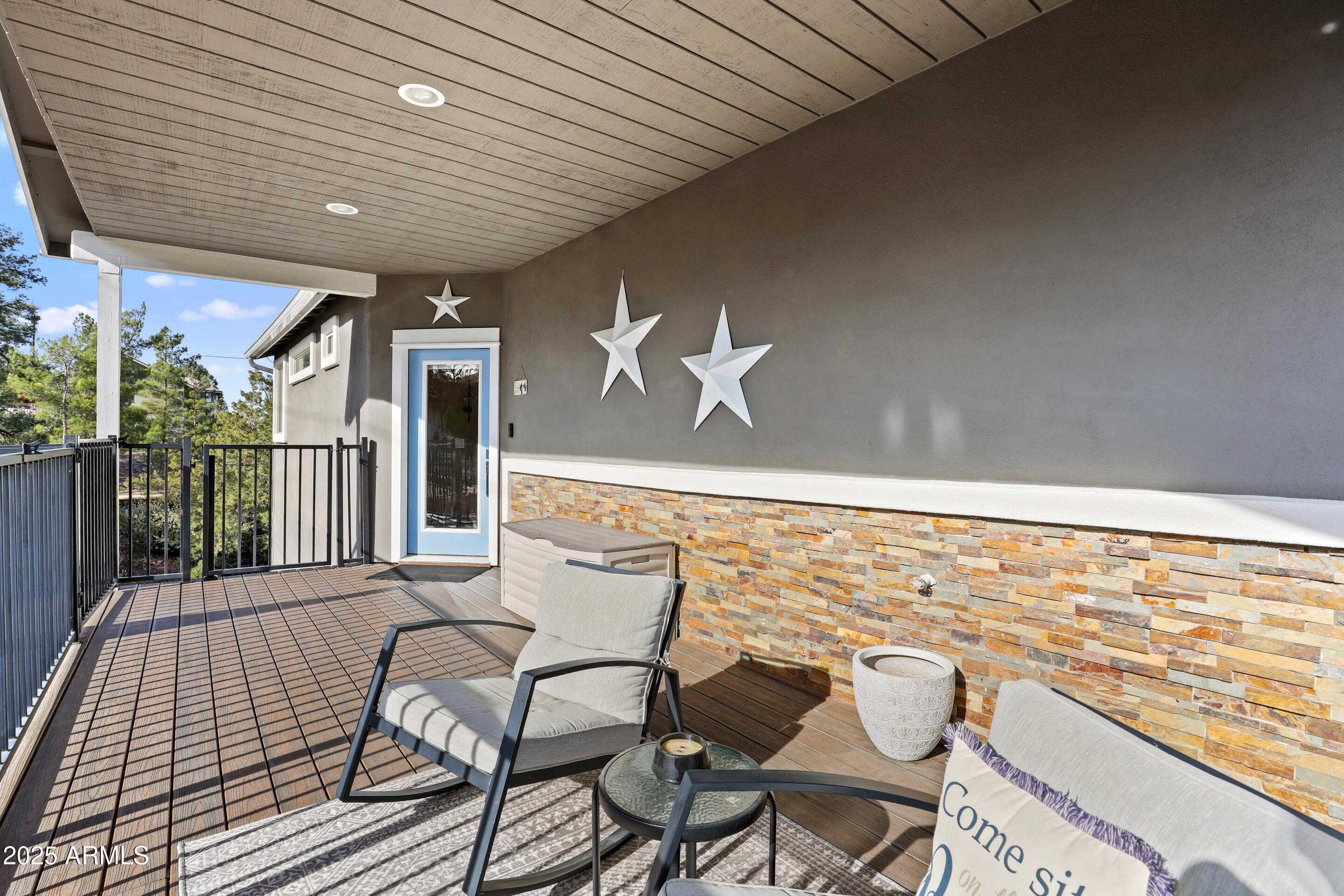 308 West Rim View Road Payson, AZ 85541 - Photo 6 of 57 a view of a chairs and table on the deck