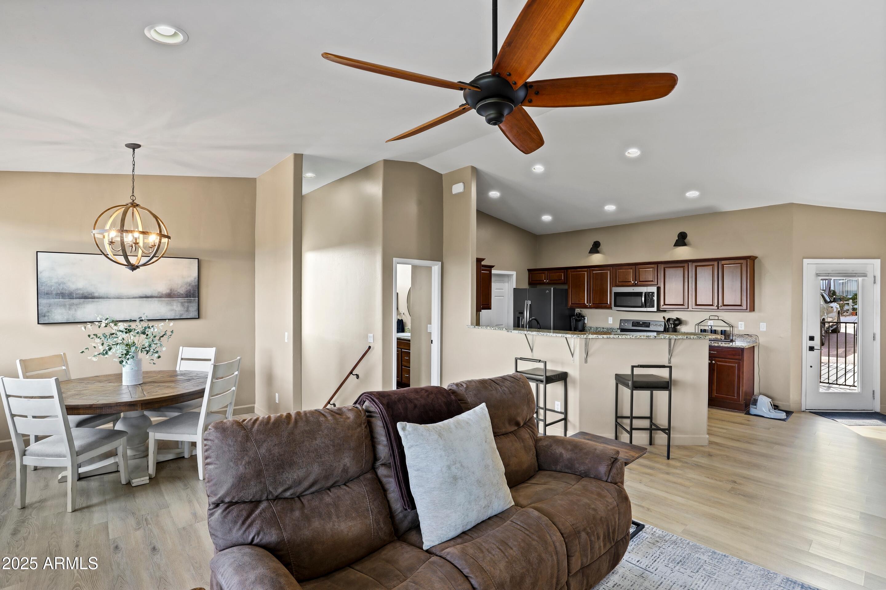 308 West Rim View Road Payson, AZ 85541 - Photo 8 of 57 a living room with furniture and kitchen view
