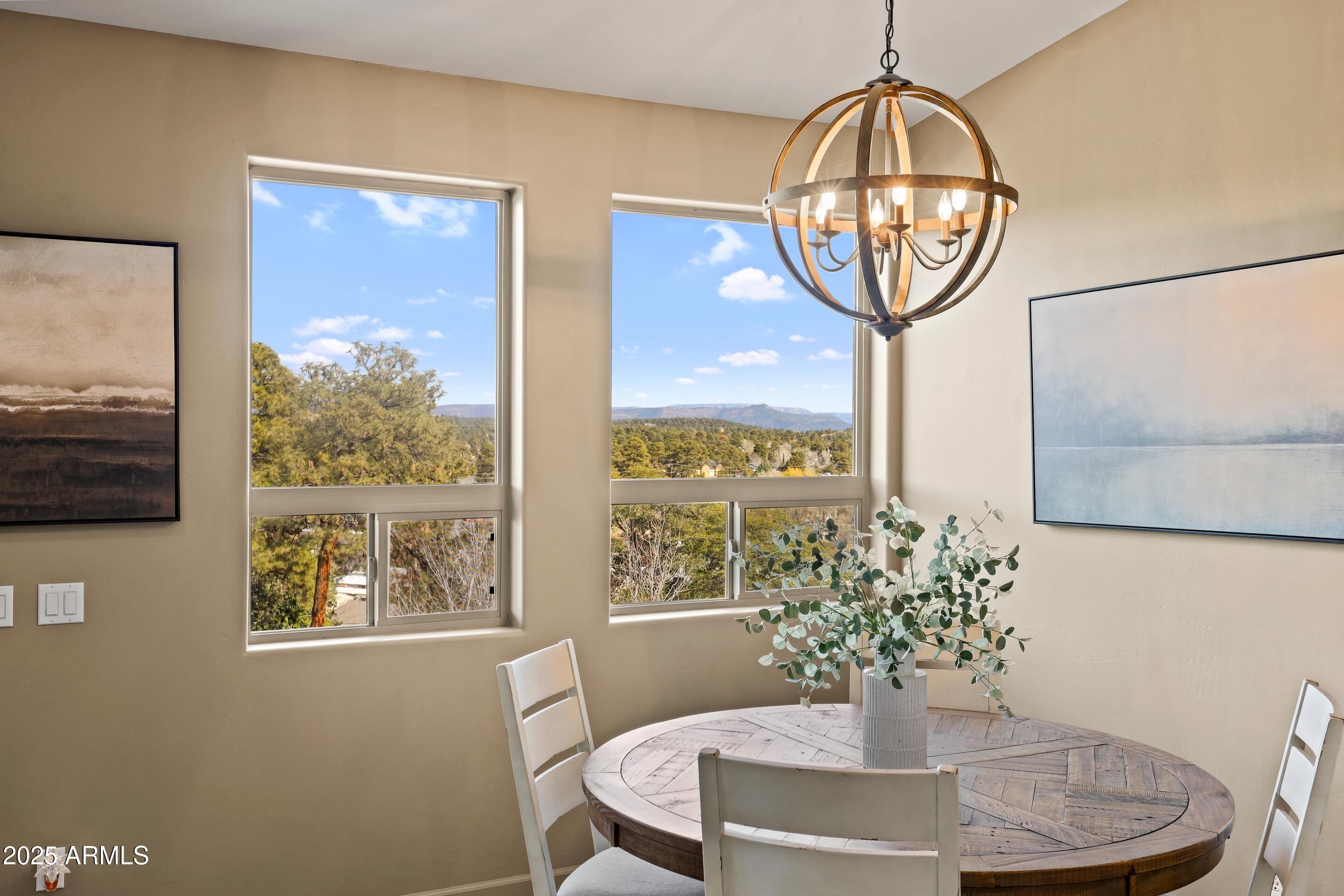 308 West Rim View Road Payson, AZ 85541 - Photo 10 of 57 a view of a dining room with furniture window and outside view