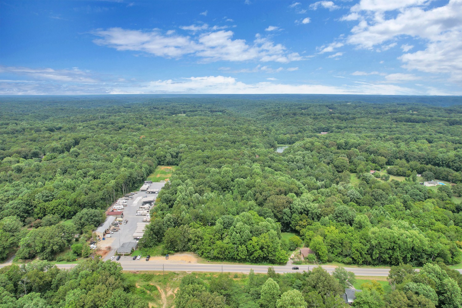 0 Fairview Boulevard Fairview, TN 37062 - Photo 3 of 6 a view of a city with lush green forest