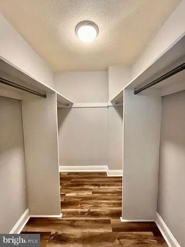 a view of room with walk in closet