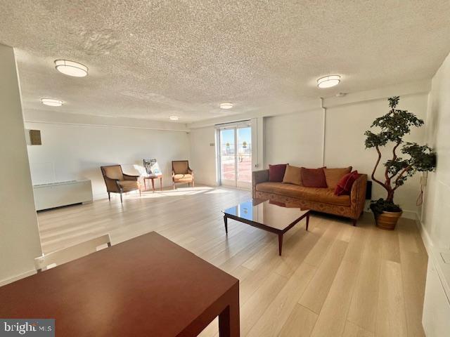 4515 Willard Avenue, Unit 1014S Chevy Chase, MD 20815 - Photo 16 of 35 a living room with furniture and a couch