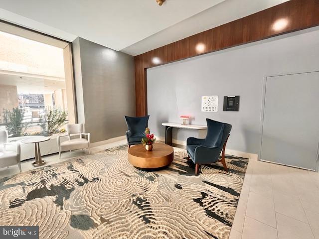 4515 Willard Avenue, Unit 1014S Chevy Chase, MD 20815 - Photo 29 of 35 a living room with furniture and a window