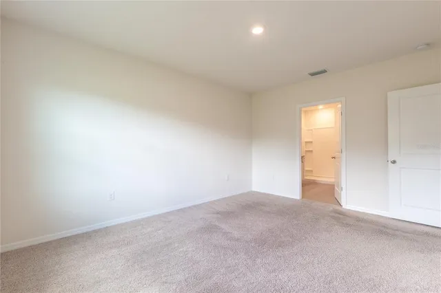 a spacious bathroom with a double vanity sink mirror double and shower