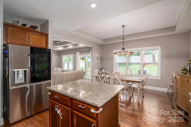 a bedroom with a bed and a tv on table