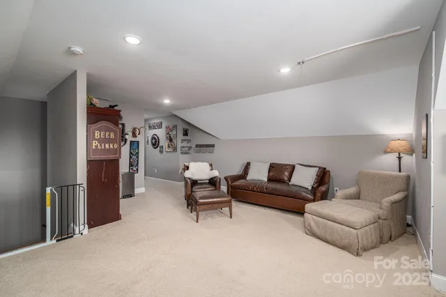 a bathroom with a sink toilet and mirror