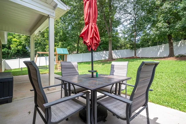 a brick house with a large window