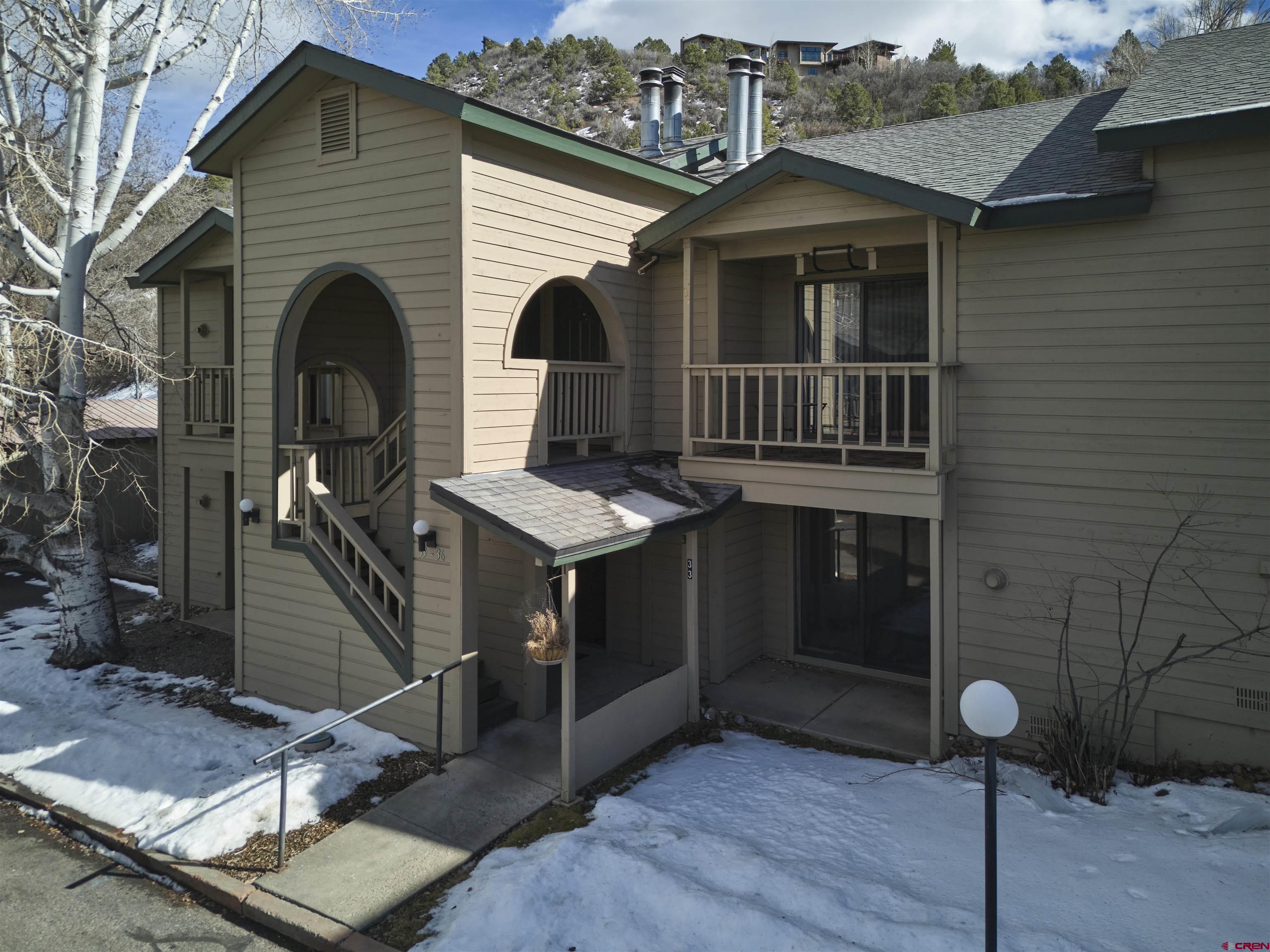 1200 Florida Road, Unit 33 Durango, CO 81301 - Photo 1 of 22 a front view of a house with entertaining space