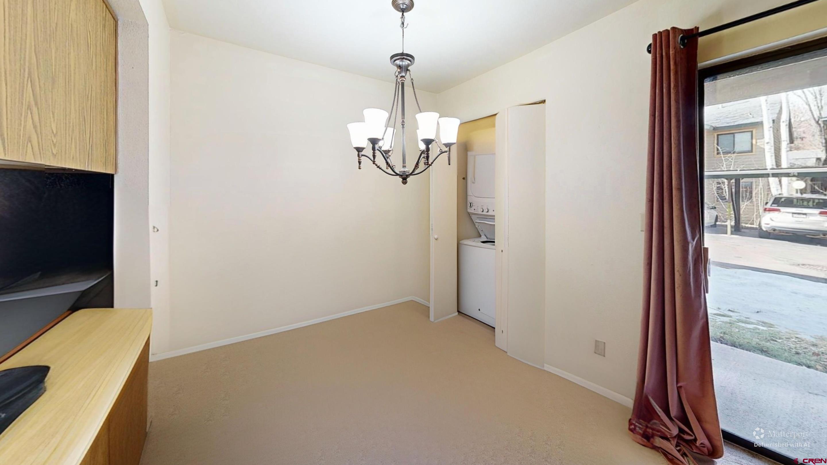 1200 Florida Road, Unit 33 Durango, CO 81301 - Photo 13 of 22 a view of a livingroom with wooden floor and windows