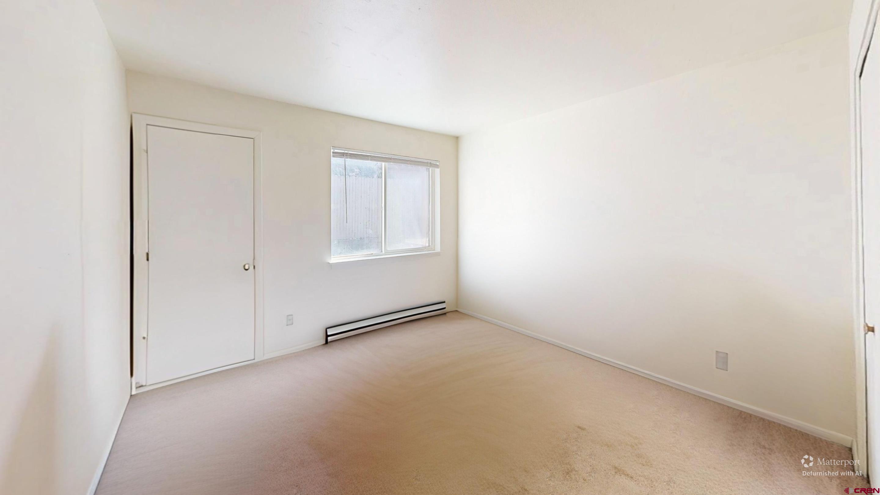 1200 Florida Road, Unit 33 Durango, CO 81301 - Photo 17 of 22 an empty room with windows