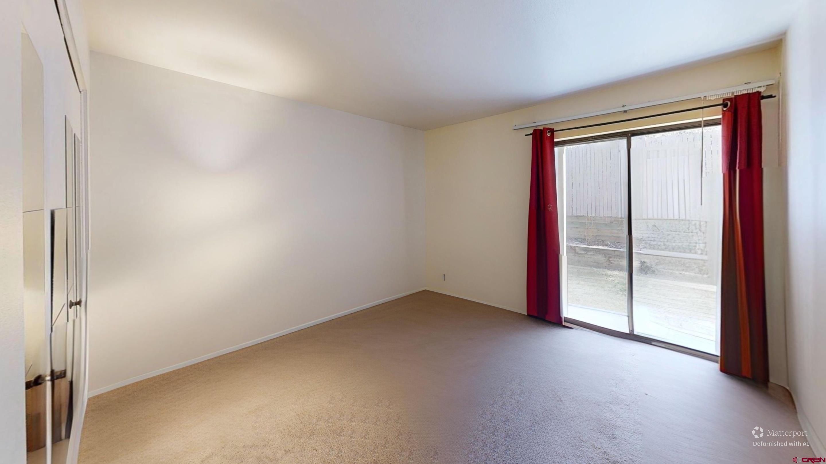 1200 Florida Road, Unit 33 Durango, CO 81301 - Photo 18 of 22 an empty room with sliding door
