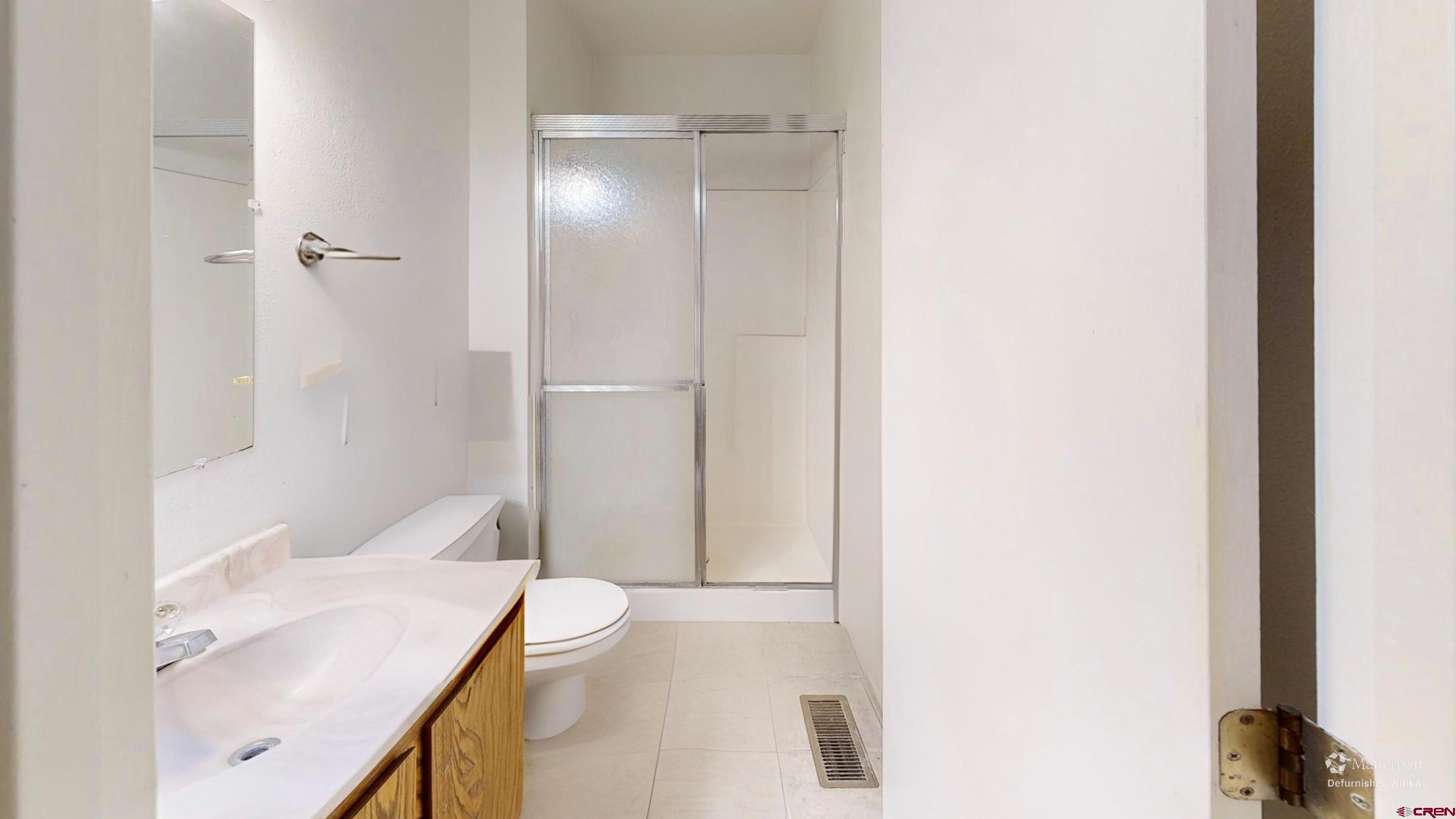 1200 Florida Road, Unit 33 Durango, CO 81301 - Photo 19 of 22 a bathroom with a sink and a mirror