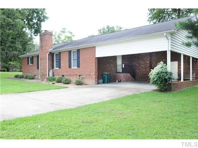540 North O'Neil Street Clayton, NC 27520 - Photo 2 of 4 a front view of house with yard and green space