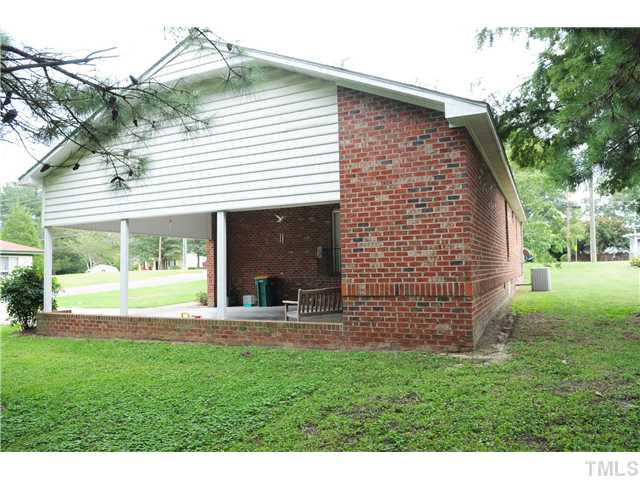 540 North O'Neil Street Clayton, NC 27520 - Photo 4 of 4 a view of a house with a yard