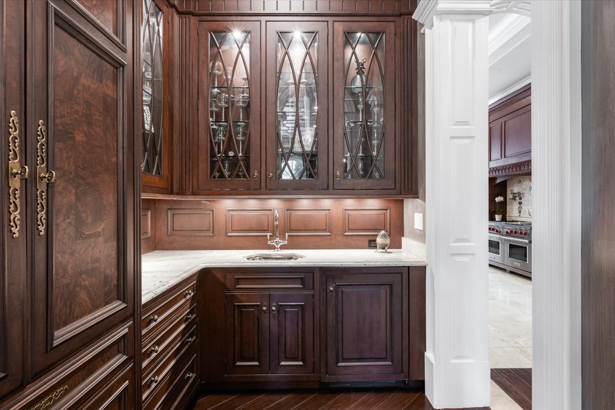 319 Sheridan Road Winnetka, IL 60093 - Photo 33 of 81 a kitchen with a sink and cabinets
