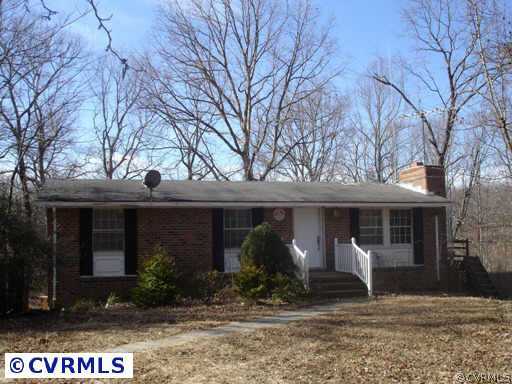 2335 Sheppard Town Road Maidens, VA 23102 - Photo 1 of 1 a front view of a house with garden