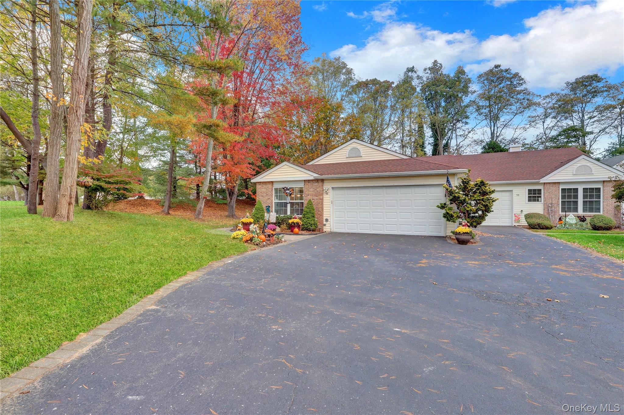 14 Chipmunk Trail Coram, NY 11727 - Photo 24 of 41 a front view of a house with garden