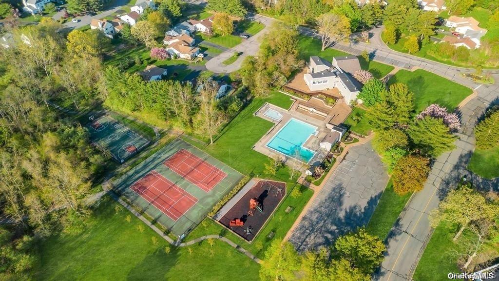 14 Chipmunk Trail Coram, NY 11727 - Photo 27 of 41 an aerial view of a house with a yard