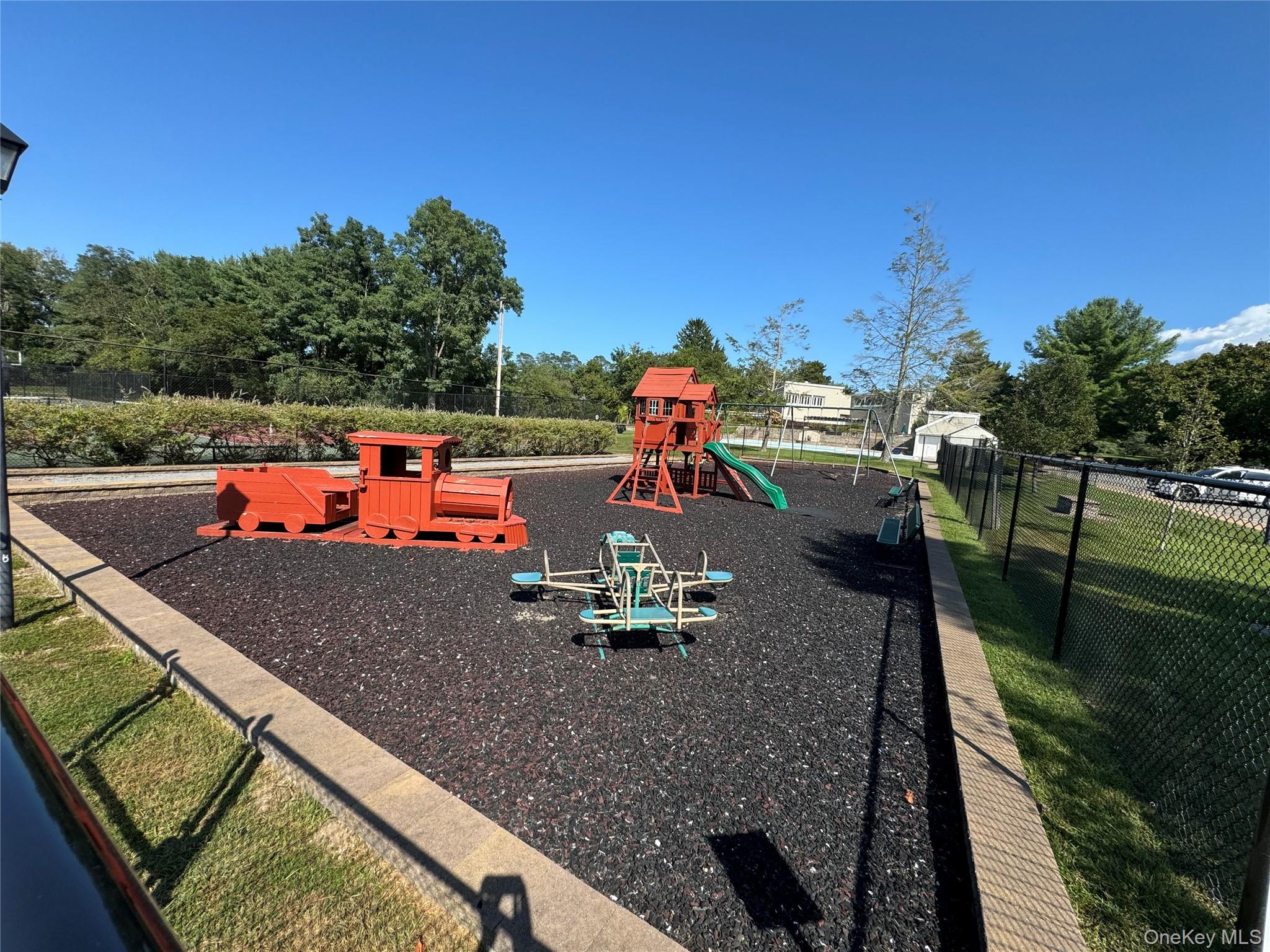 14 Chipmunk Trail Coram, NY 11727 - Photo 30 of 41 swimming pool view with a sitting space