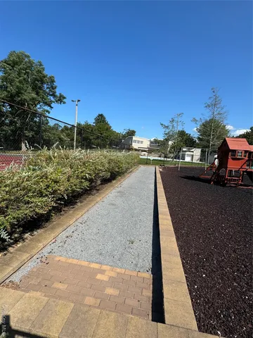 a view of a street with cars on road
