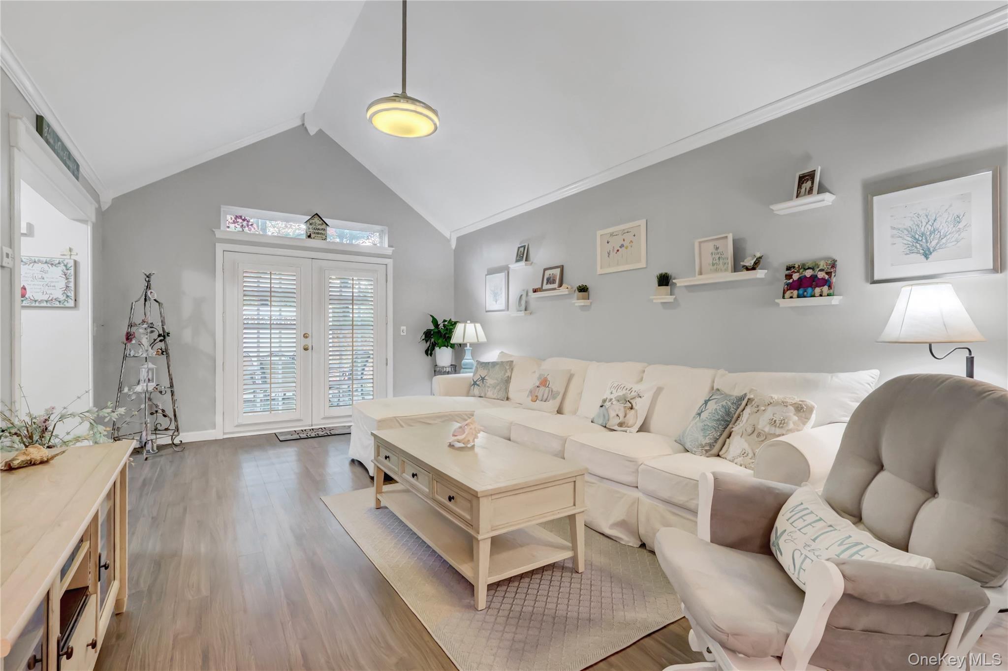 14 Chipmunk Trail Coram, NY 11727 - Photo 6 of 41 a living room with furniture and wooden floor
