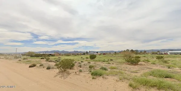 an aerial view of beach and city