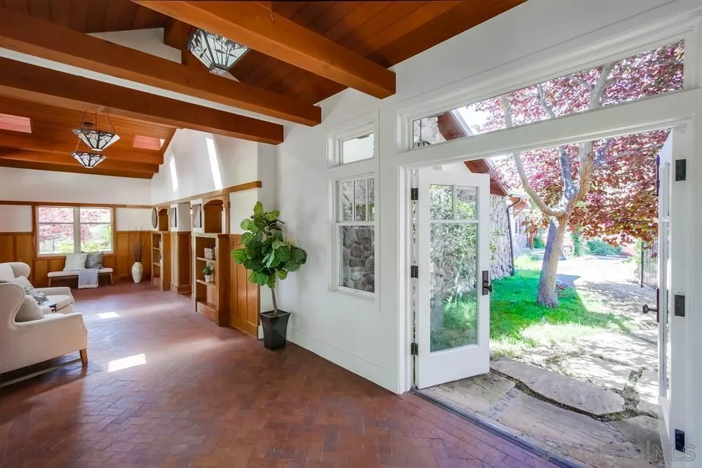 13980 Millards Ranch Lane Poway, CA 92064 - Photo 12 of 75 a living room with furniture and a floor to ceiling window
