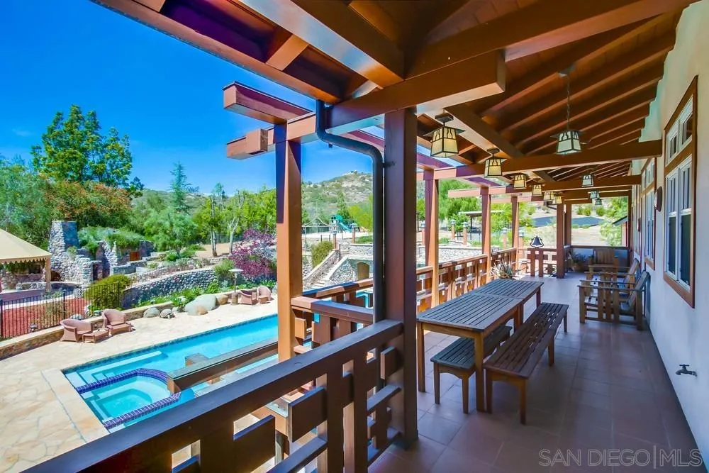 13980 Millards Ranch Lane Poway, CA 92064 - Photo 30 of 75 a view of a chairs and table in the patio