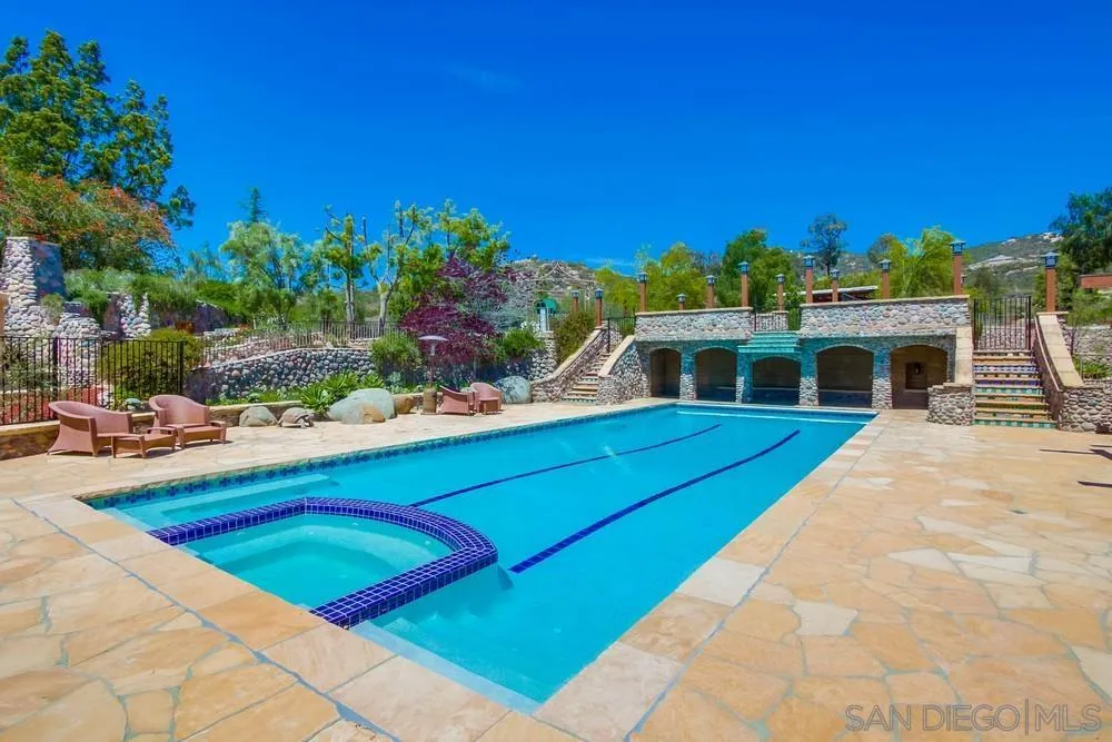 13980 Millards Ranch Lane Poway, CA 92064 - Photo 36 of 75 a front view of a house with a yard
