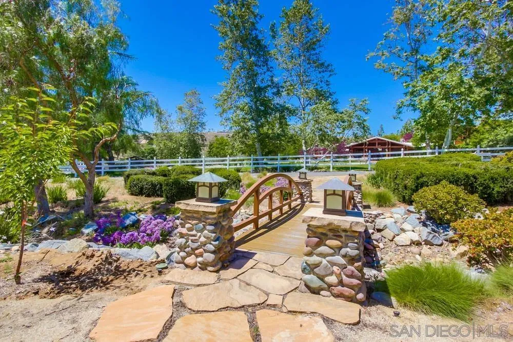 13980 Millards Ranch Lane Poway, CA 92064 - Photo 4 of 75 a view of a chairs and table in the patio