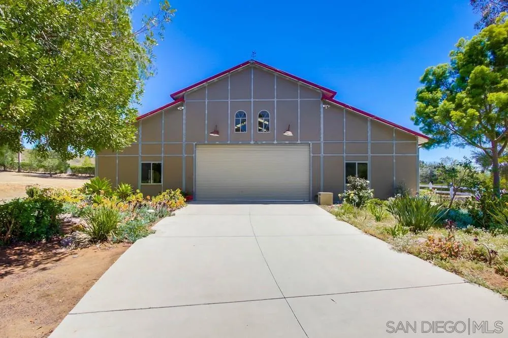 13980 Millards Ranch Lane Poway, CA 92064 - Photo 43 of 75 a front view of a house with garden