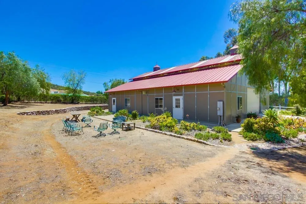 13980 Millards Ranch Lane Poway, CA 92064 - Photo 44 of 75 a view of a house with backyard and sitting area